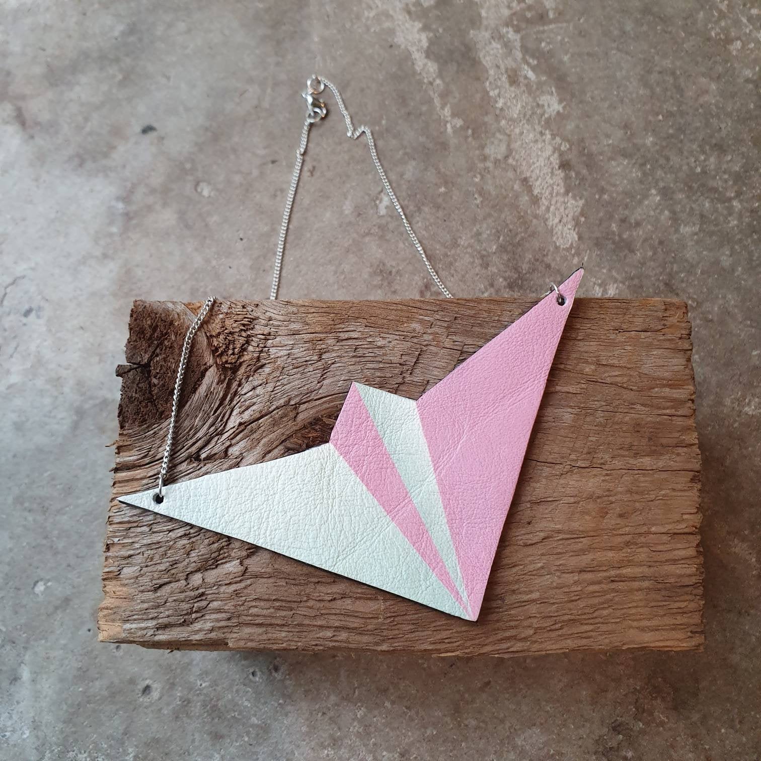 Leather paper aeroplane bib necklace