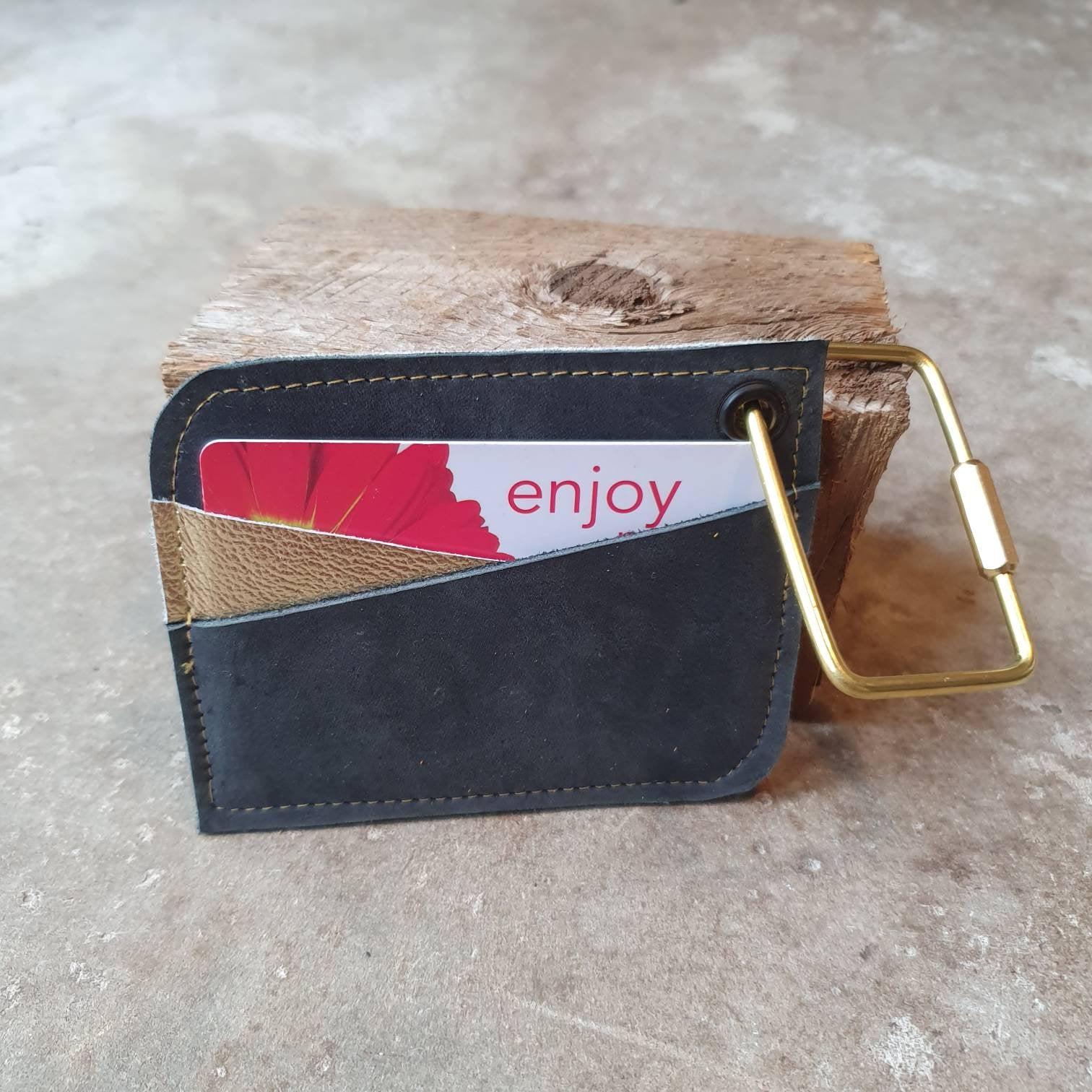 Black and gold leather card wallet