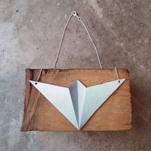 Leather paper aeroplane bib necklace