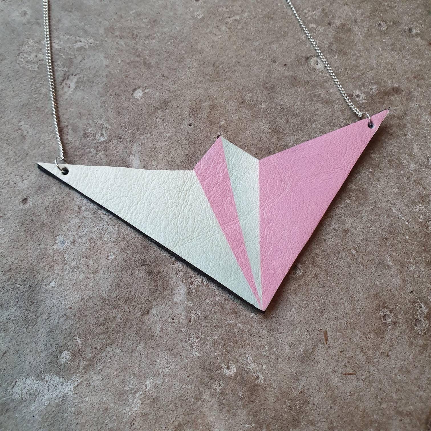 Leather paper aeroplane bib necklace