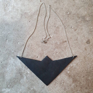 Leather paper aeroplane bib necklace