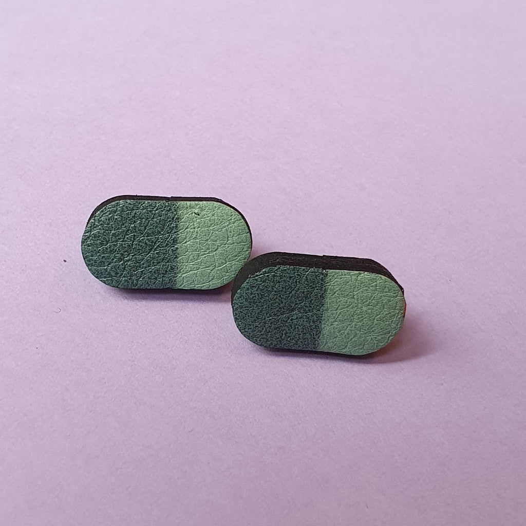 Happy pills stud earrings in double teal